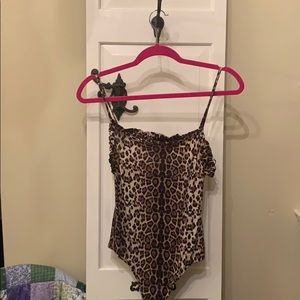 Kittenish Leopard Body suit new with tags.